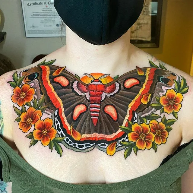 Colorful butterfly tattoo design on back for women.
