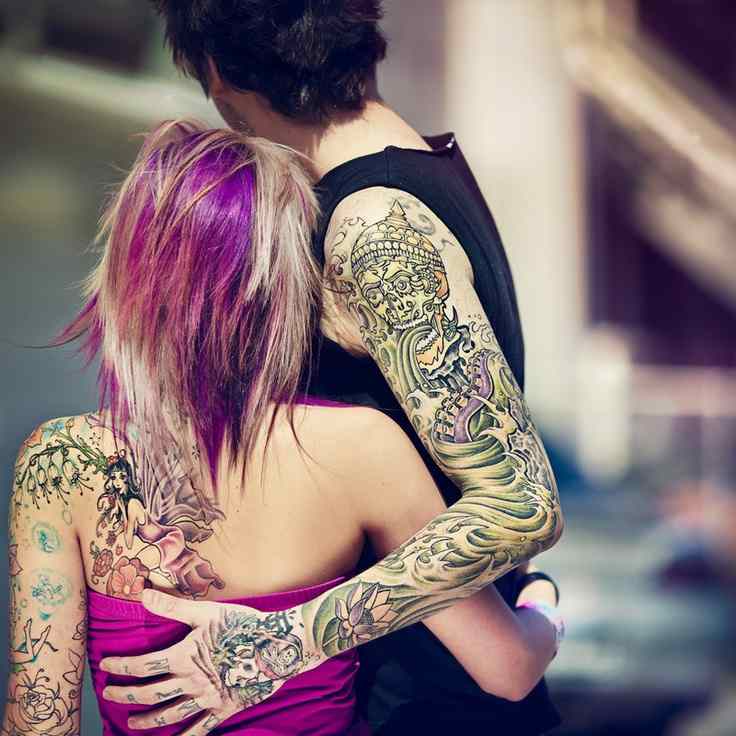Romantic Couple Tattoos Showing Matching Designs