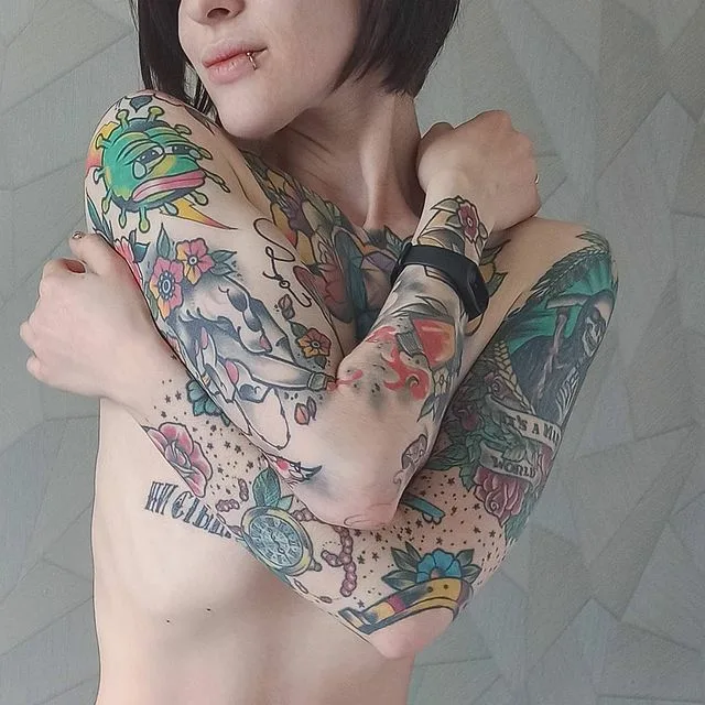 Romantic Couple Tattoos Showing Matching Designs